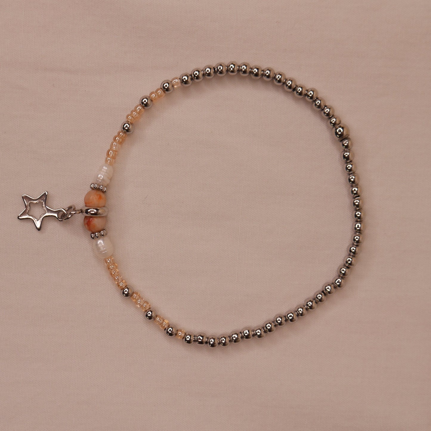 Bracelet saumon étoile